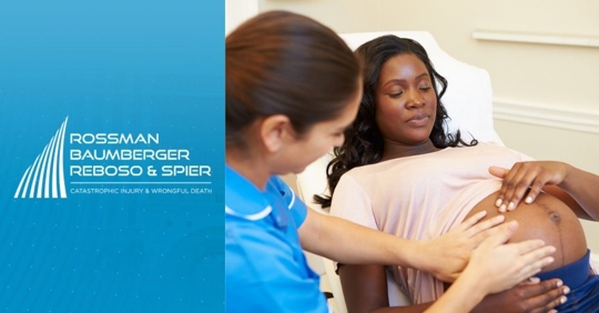 Pregnant black woman receiving prenatal care